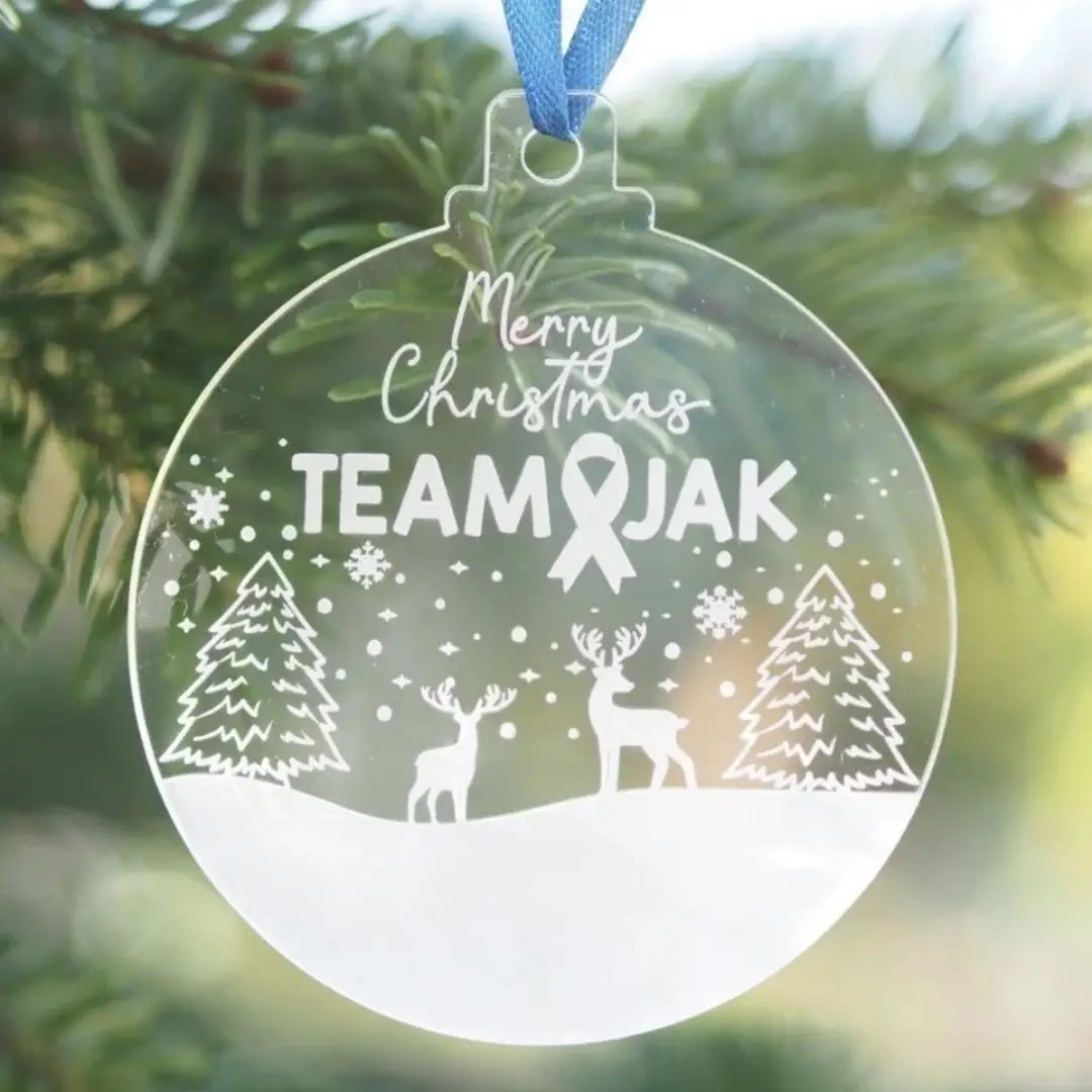 Team Jak's lightweight Christmas Baubles some in four printed designs — Reindeer, TJ the Mascot, Polar Bear, and Stocking. Each features Team Jak’s signature colours and is supplied with a ribbon.